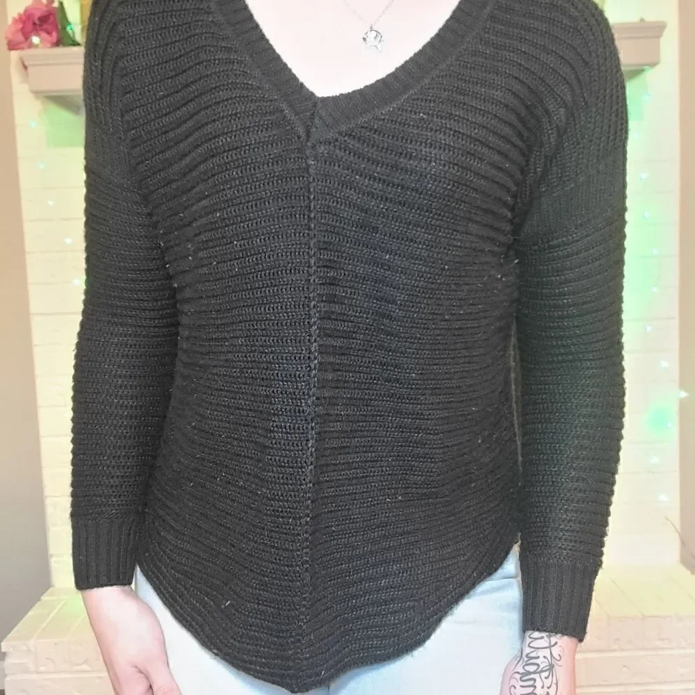 Black knitted sweater by Sam Edelman